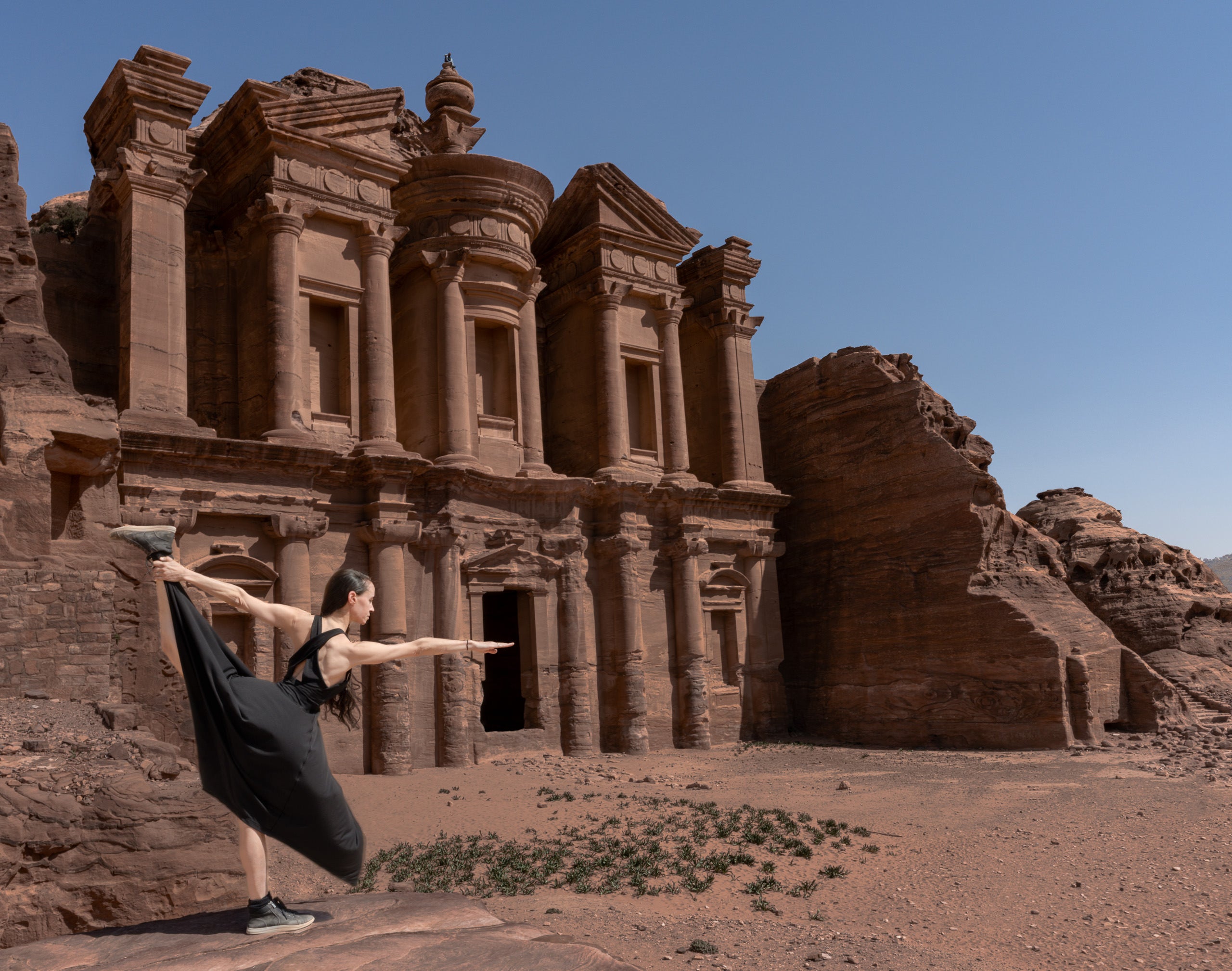 Woman doing yoga pose in Petra