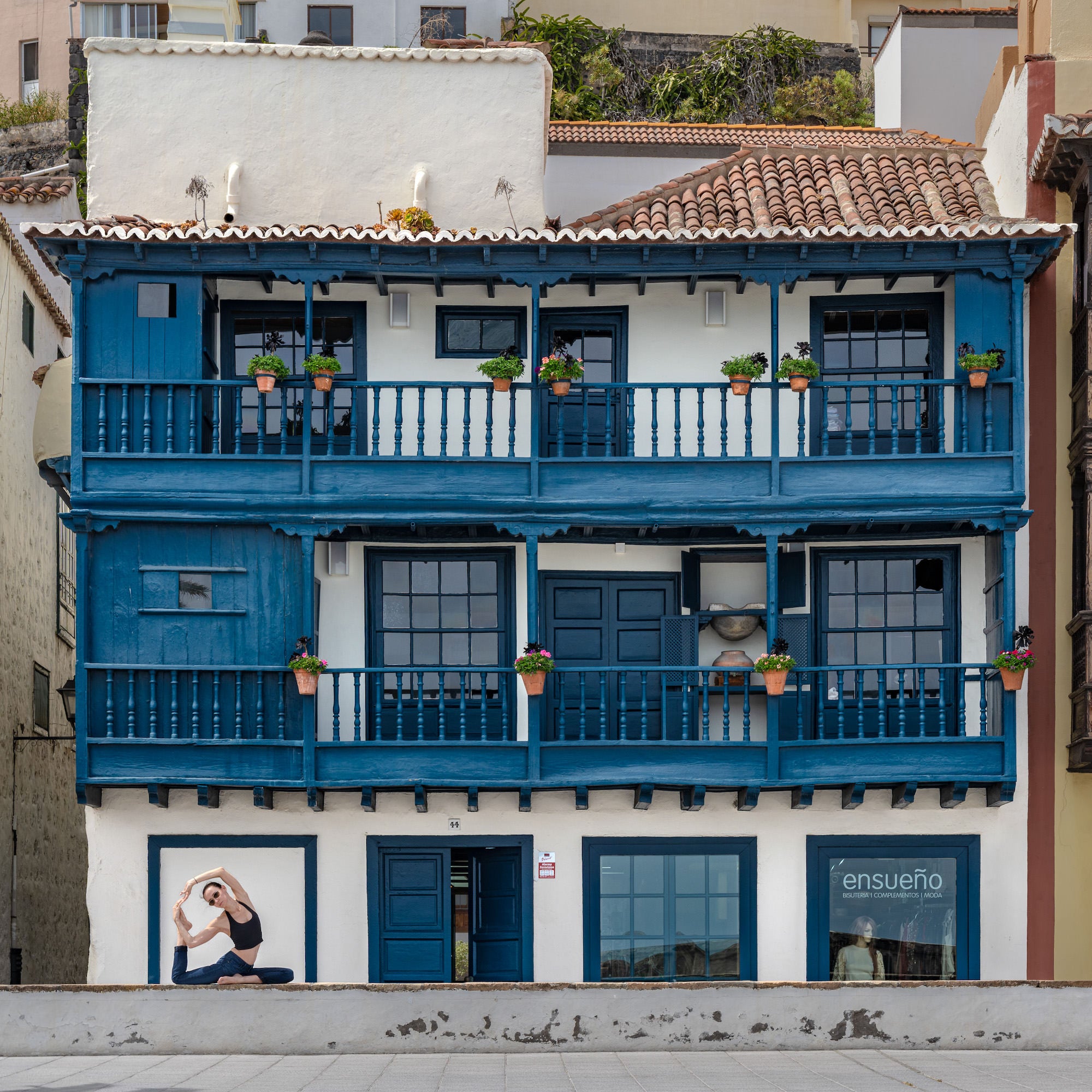 Woman doing yoga pose in Santa Cruz De La Palma Spain