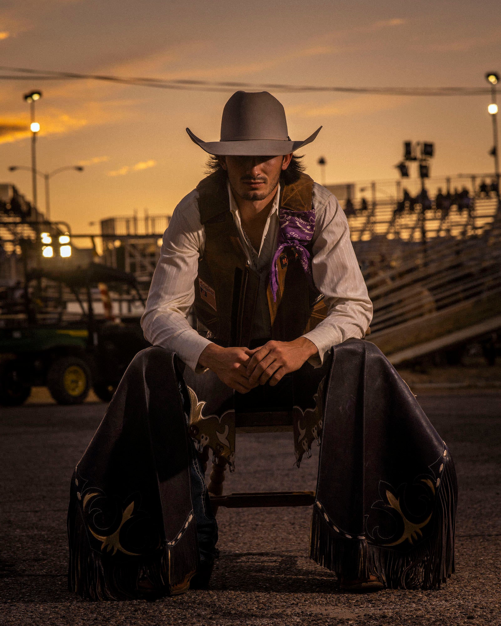 Cowboy sitting at rodeo