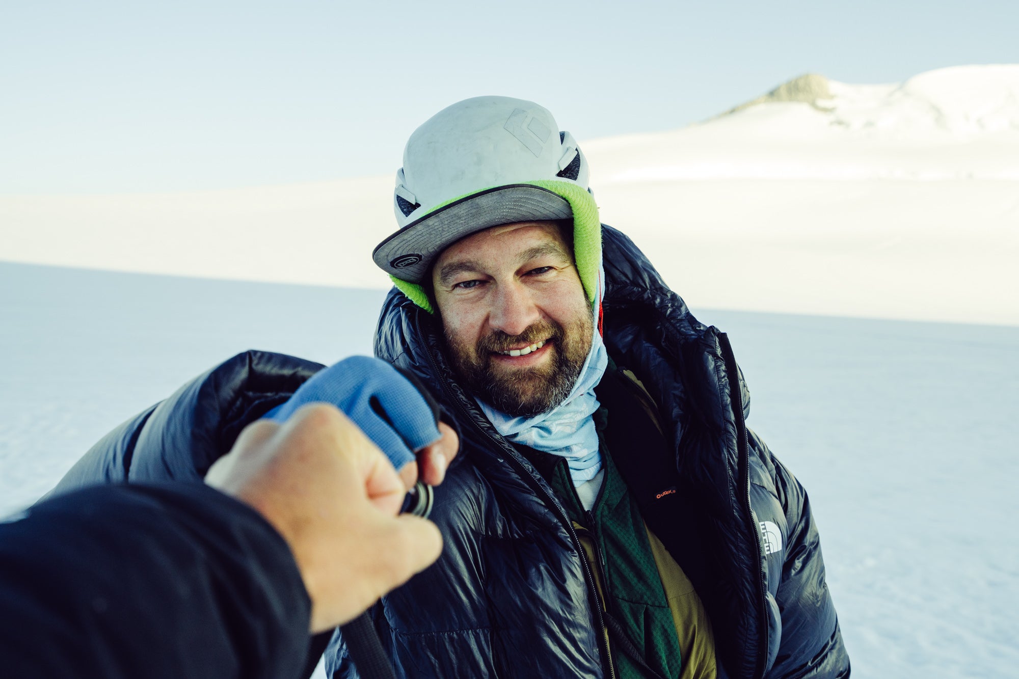 Sony Artisan Renan Ozturk fist bumps the photographer.